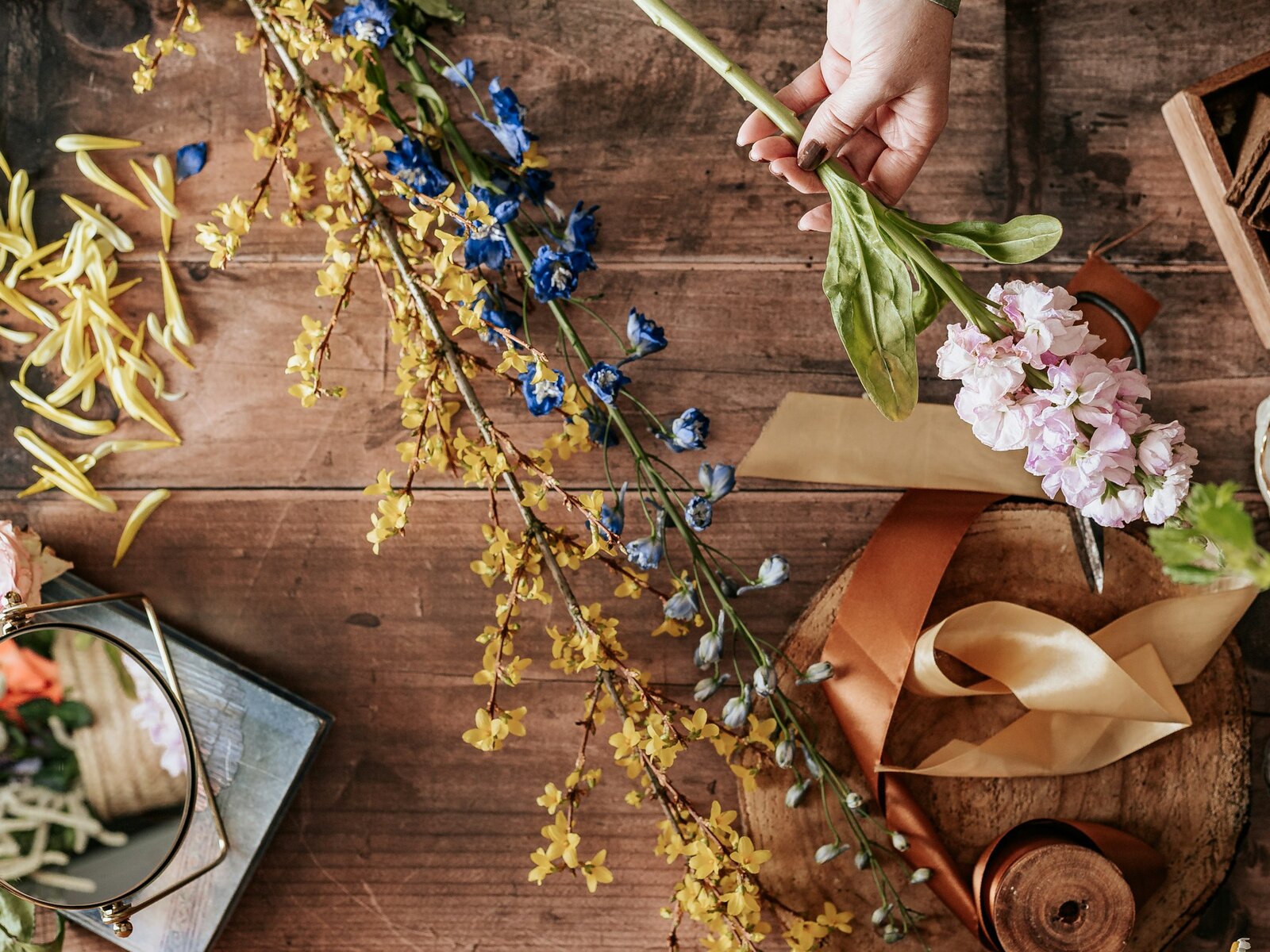 A florist arranging flowers in the shop
